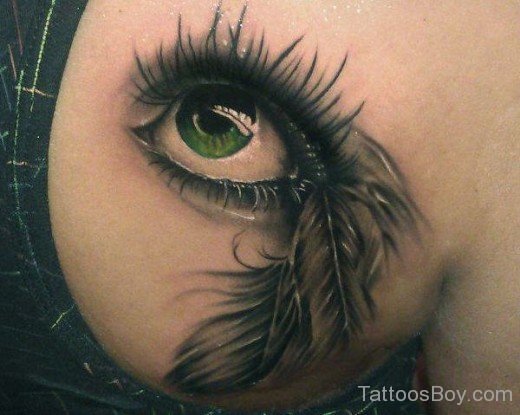 Eye And Feather Tattoo On Back