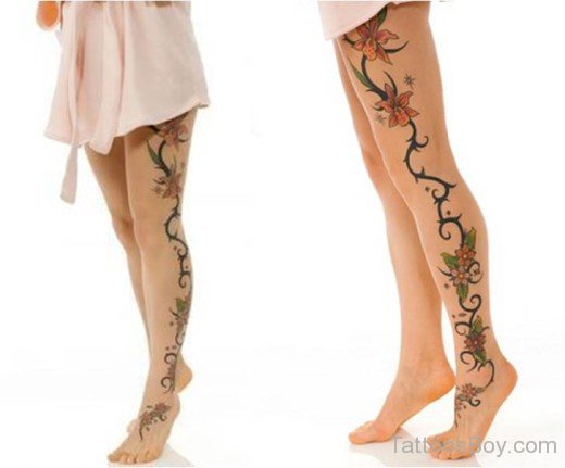 Flower And Tribal Tattoo On Leg