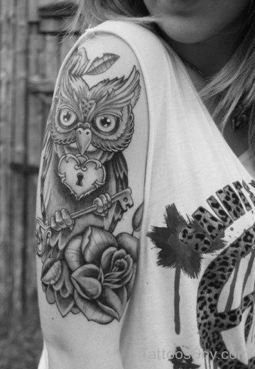 Owl And Flower Tattoo On Shoulder