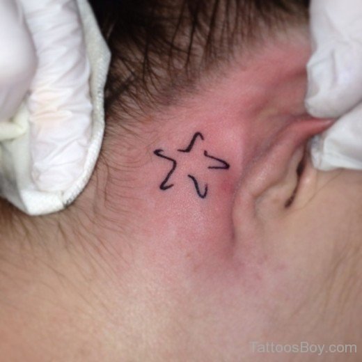Starfish Tattoo On Behind Ear