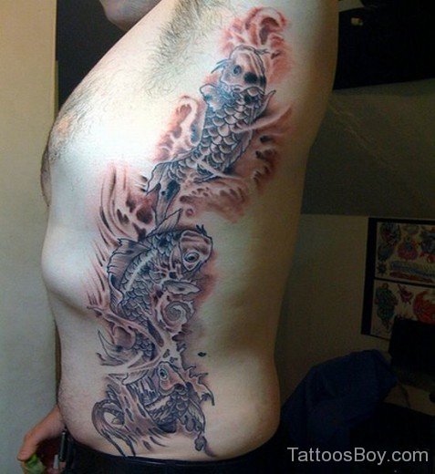 Amazing Koi Fiish Tattoo On Rib