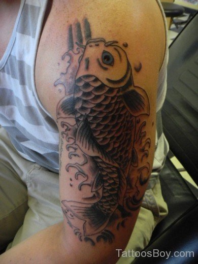 Coy Fish Tattoo On Bicep
