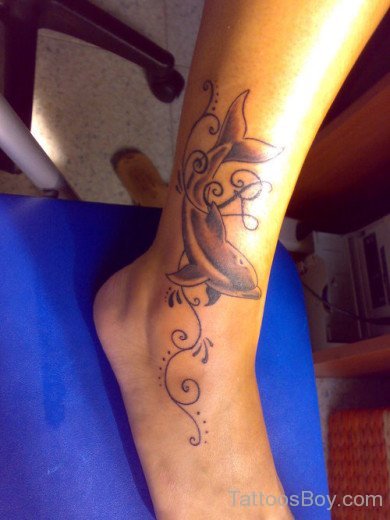 Dolpin Tattoo On Ankle
