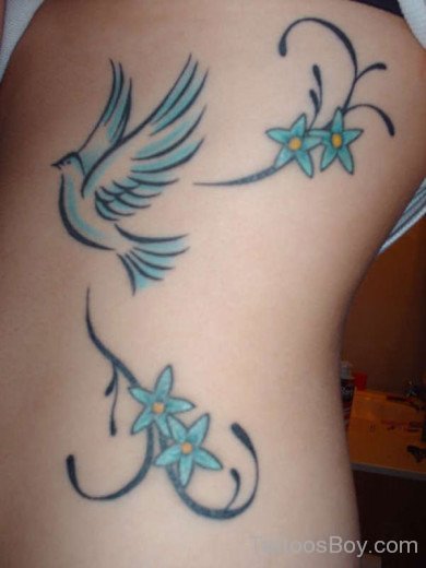 Dove And Star Tattoo On Rib