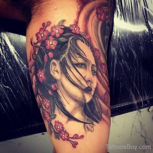 Girl Face Tattoo On Bicep