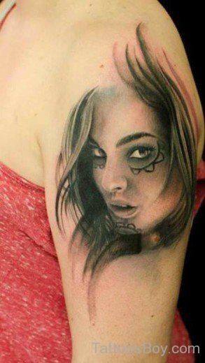 Girl Face Tattoo On Shoulder
