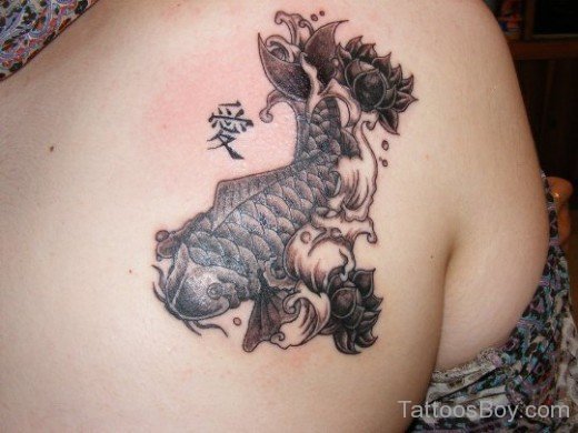 Awesome Fish Tattoo Design On Back 