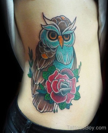 Owl And Rose Tattoo Design On Rib 