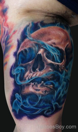 Smokey Skull Tattoo On Bicep