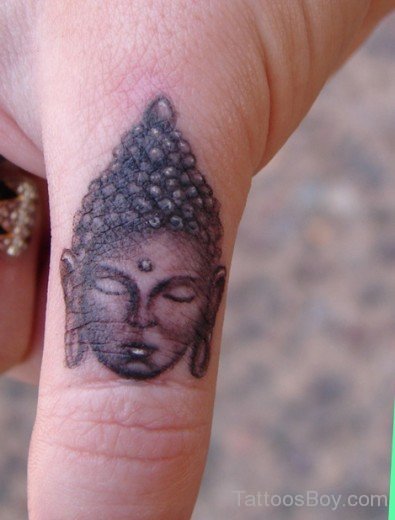 Buddha Tattoo On Finger