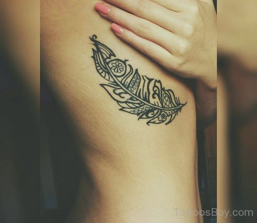  Feather Tattoo On Rib 