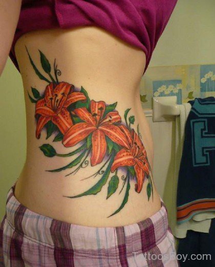  Hawaiian Flower Tattoo On Rib 