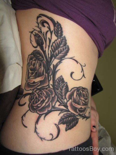 Black Rose Tattoo On Rib