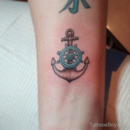 Blue Ship Wheel Tattoo