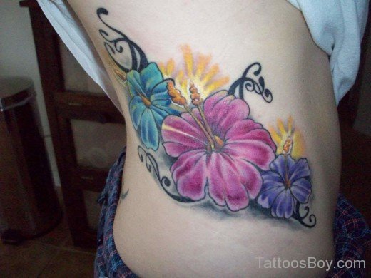 Hawaiian Flower Tattoo On Rib