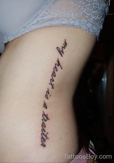 Lettering Tattoo On Rib