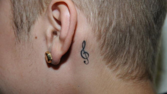 Music Notes Tattoo On Behind Ear | Tattoo Designs, Tattoo Pictures