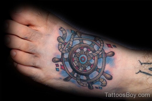 Ship Wheel Tattoo On Foot 