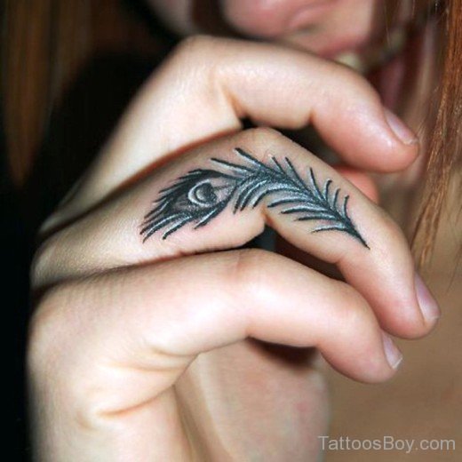  Peacock Feather Tattoo On Finger