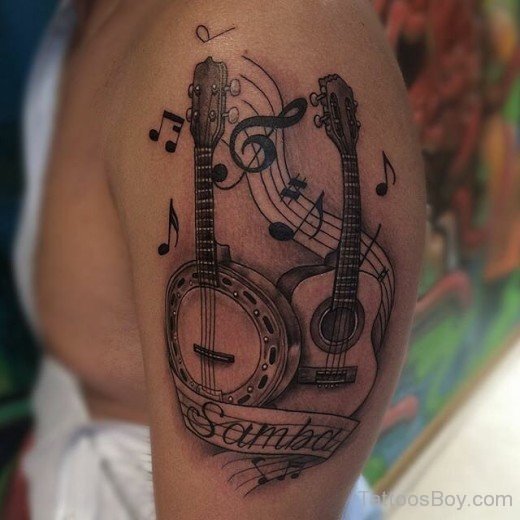 Guitar Tattoo On Shoulder