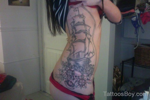 Pirate Ship Tattoo On Rib