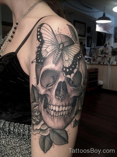 Skull And Butterfly Tattoo On Shoulder