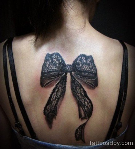 Black Bow Tattoo On Back 