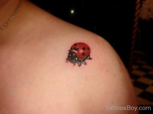 Red Ladybug Tattoo On Shoulder