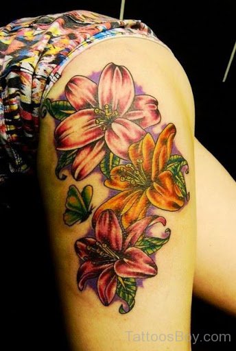 Beautiful Lily Flower Tattoo Design On Thigh