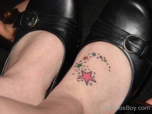 Colored Star Tattoo On Foot