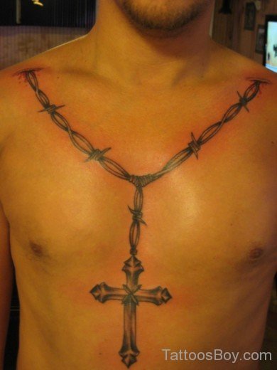Cross  And Barbed Wire Tattoo On Chest