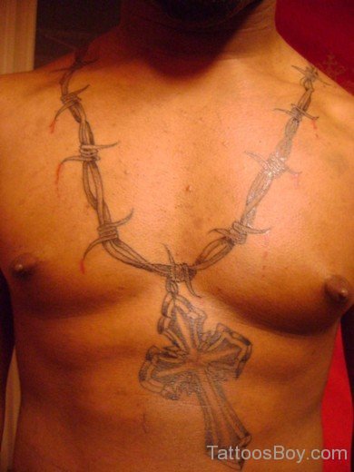 Cross And Barbed Wire Tattoo On Chest