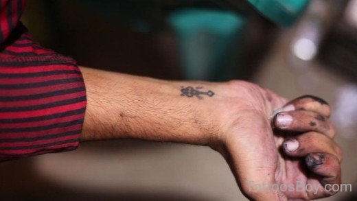 Cross Tattoo On Wrist