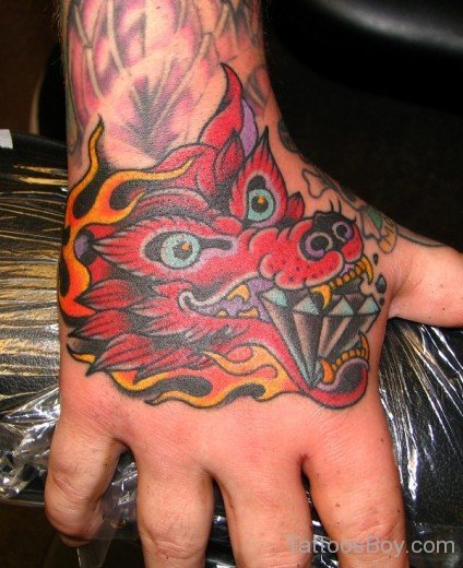 Dragon Face Tattoo On Hand