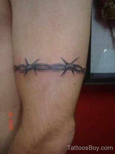 Elegant Barbed Wire Tattoo On Bicep