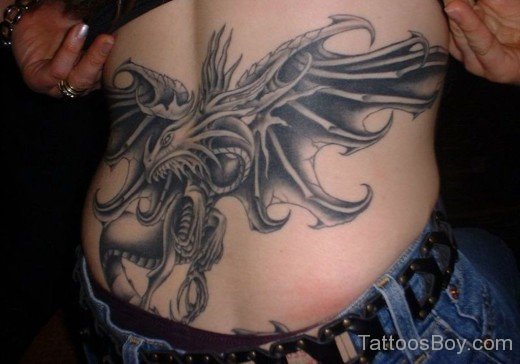 Elegant Lower Back Tattoo