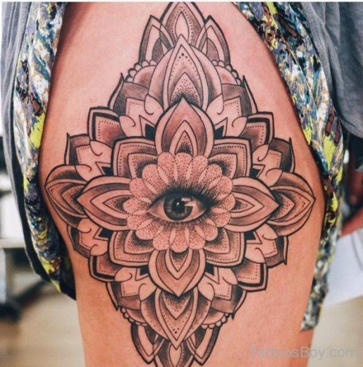 Elegant Thigh Tattoo