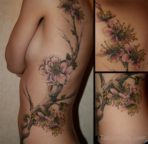 Floral Flower Tattoo On Rib 