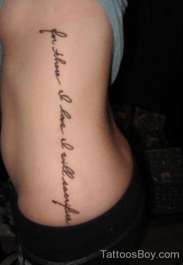 Freanch Wording Tattoo On Rib