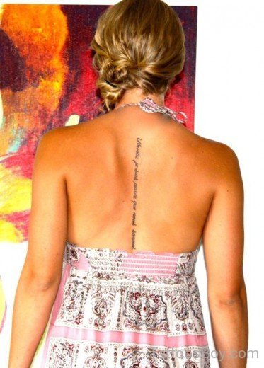 French Wording Tattoo On Back
