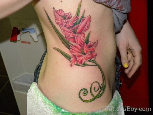 Gladiolus Flower Tattoo Design On Rib