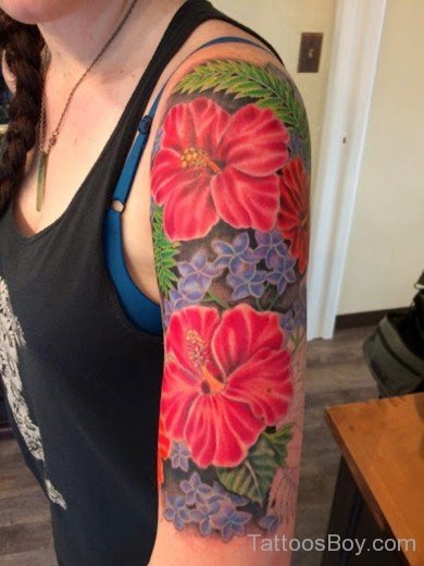 Hawaiian Flower Tattoo On Half Sleeve