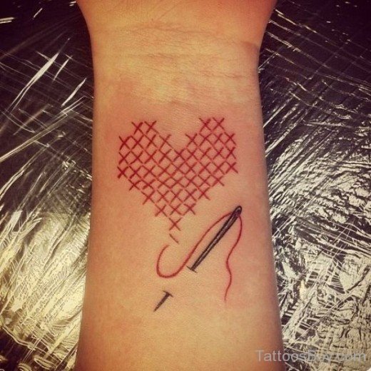 Heart Cross Stitch Tattoo