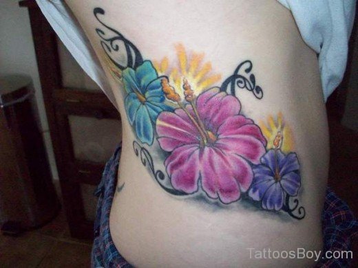 Hibiscus Flower Tattoo On Rib