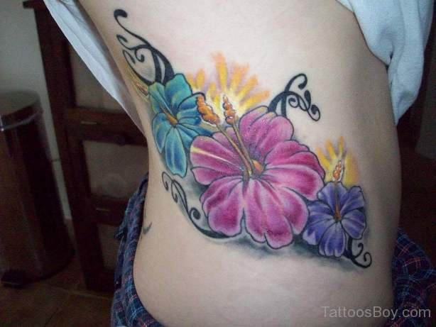 7. Rainbow hibiscus tattoo - wide 8