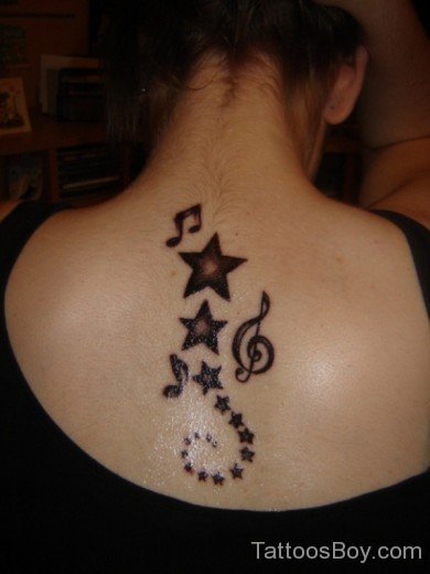Misical Star Tattoo On Back