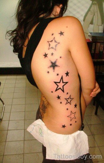 Star Tattoo On Rib