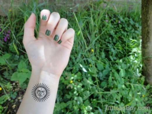 Sun Tattoo On Wrist