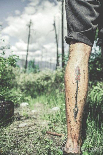 Tribal Arrow Tattoo on Leg