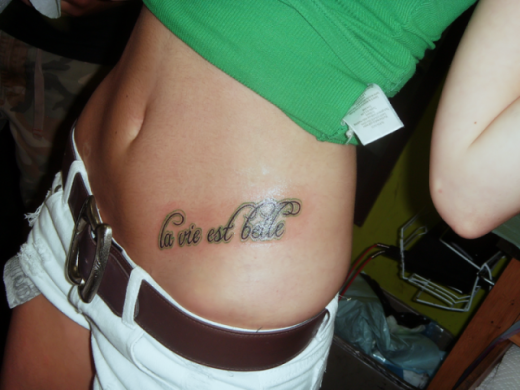 Word Tattoo on Stomach